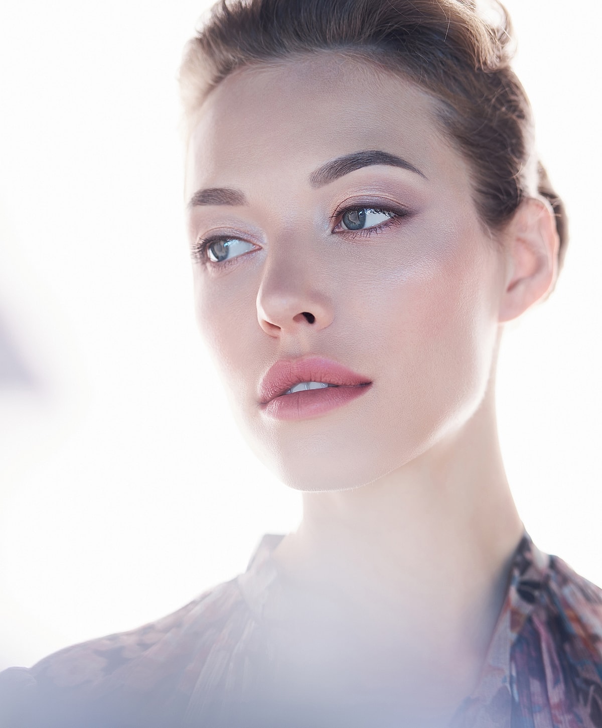 Close-up of a woman's elegant facial features.