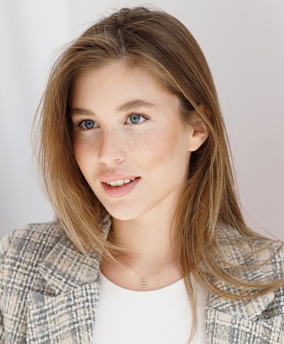 Portrait of a young woman with natural makeup.